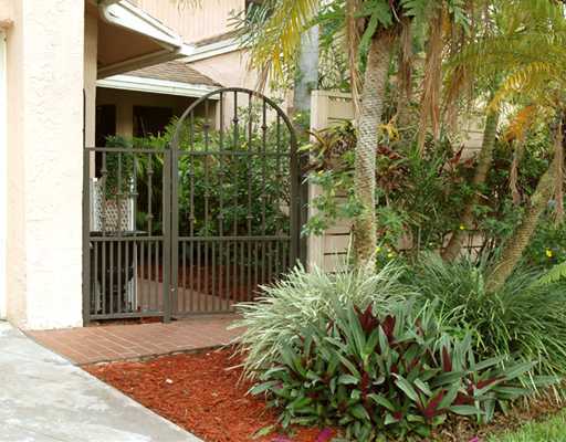 6347 Toulon Drive Boca Raton, FL 33433 - Photo 2 of 24 a view of a pathway of a building