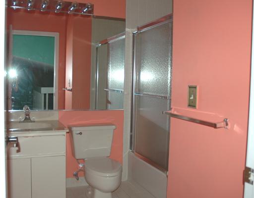 6347 Toulon Drive Boca Raton, FL 33433 - Photo 22 of 24 a bathroom with a sink mirror vanity and toilet