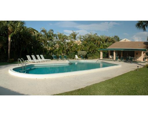 6347 Toulon Drive Boca Raton, FL 33433 - Photo 23 of 24 a view of a house with a yard