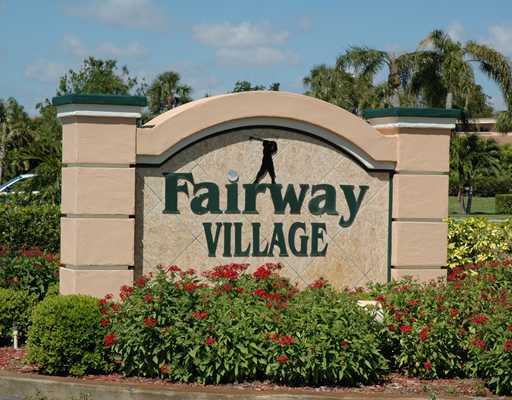 6347 Toulon Drive Boca Raton, FL 33433 - Photo 24 of 24 a sign on the side of a building
