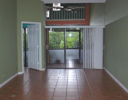 6347 Toulon Drive Boca Raton, FL 33433 - Photo 7 of 24 a view of entryway with a floor to ceiling window and stairs