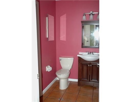 6347 Toulon Drive Boca Raton, FL 33433 - Photo 10 of 24 a bathroom with a toilet and a sink