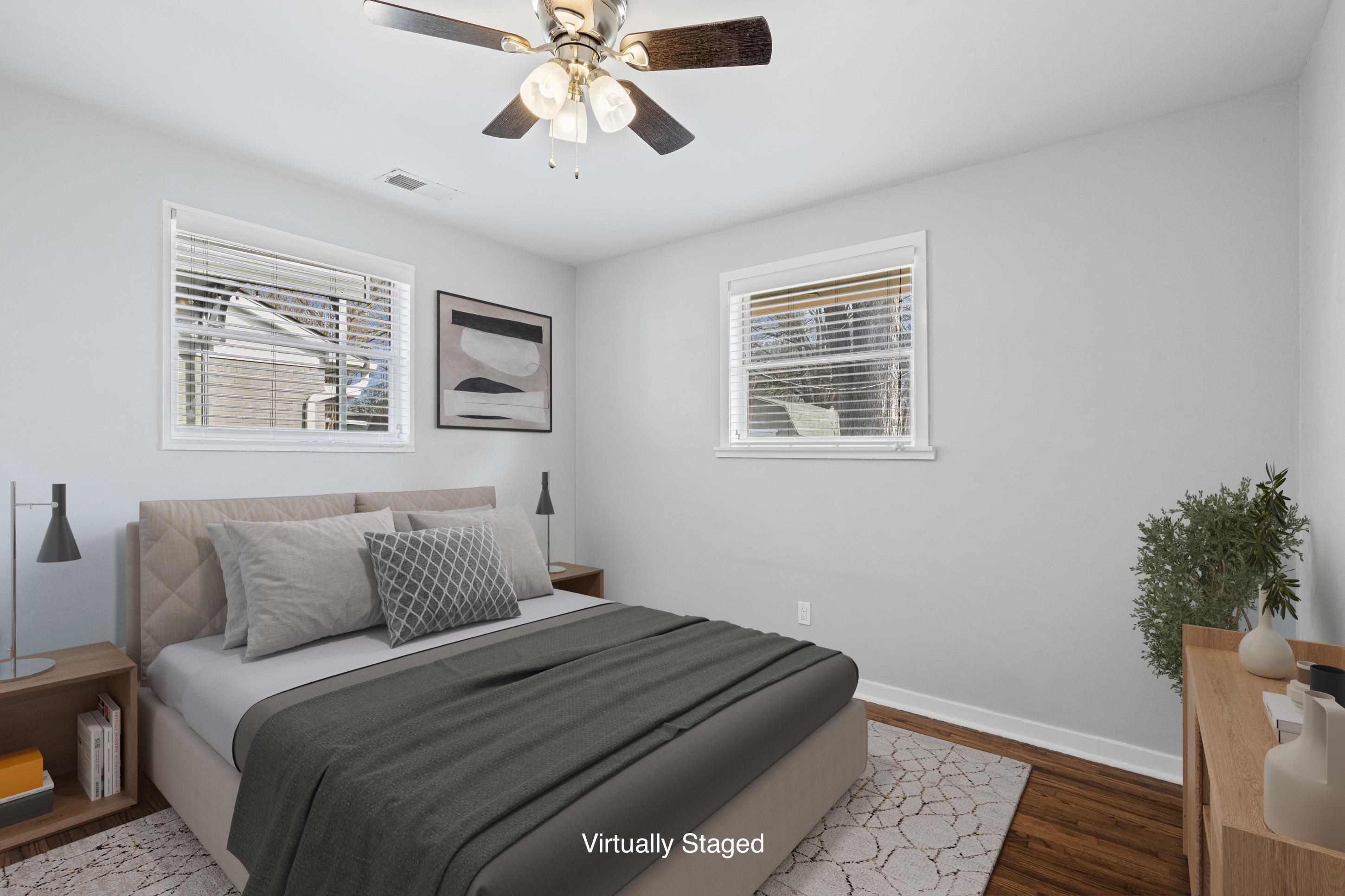 506 McDermitt Road Memphis, TN 38120 - Photo 12 of 29 Bedroom featuring dark wood finished floors and a ceiling fan