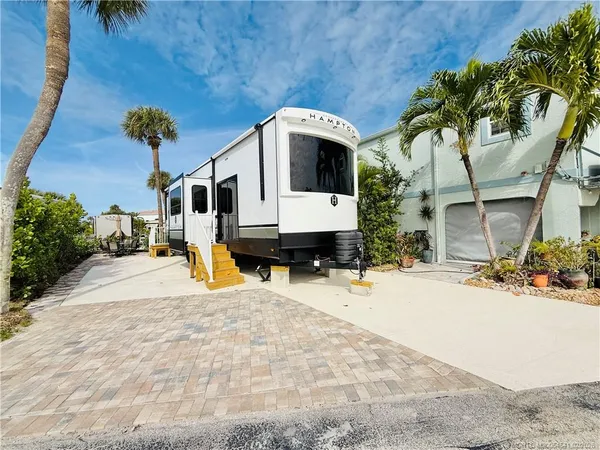 a house view with a outdoor seating space