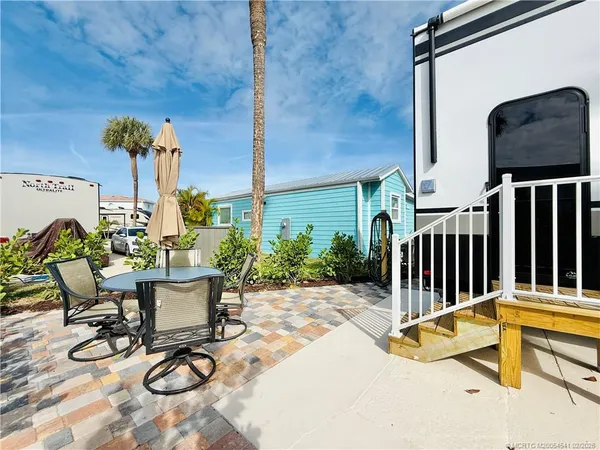 a view of a balcony with an ocean view