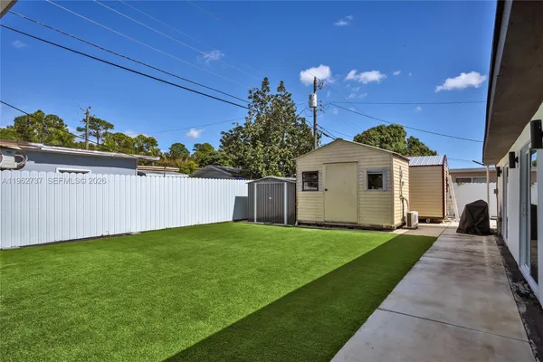 a view of a porch with a backyard