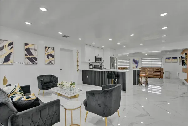 a living room with furniture and a table
