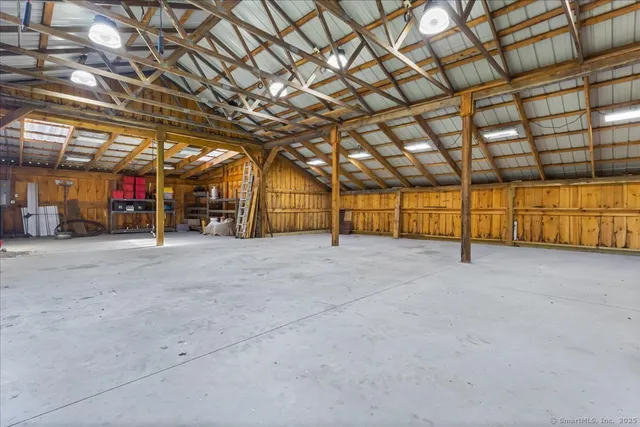 a view of a room with wooden walls