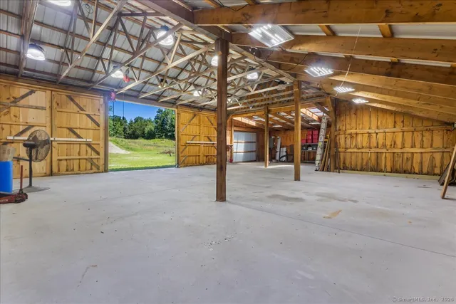 a view of a room with wooden walls