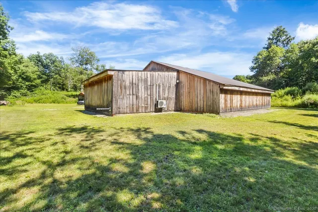 a view of a house with a big yard