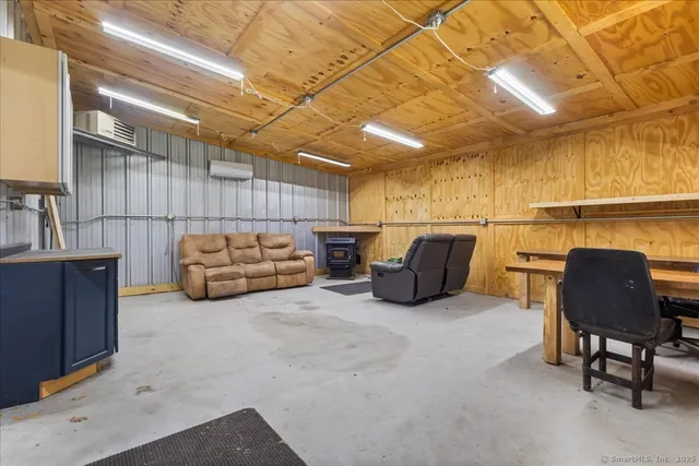 a living room with furniture and a couch