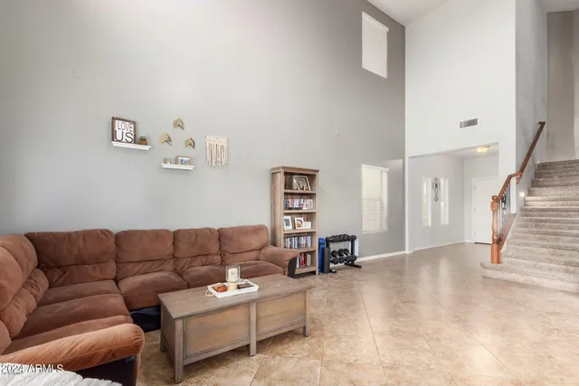 a living room with furniture and a couch