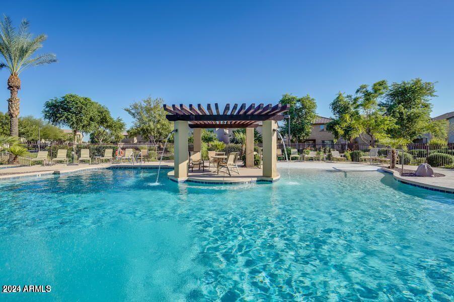 2217 West Kathleen Road Phoenix, AZ 85023 - Photo 40 of 42 a view of a table and chairs in the garden