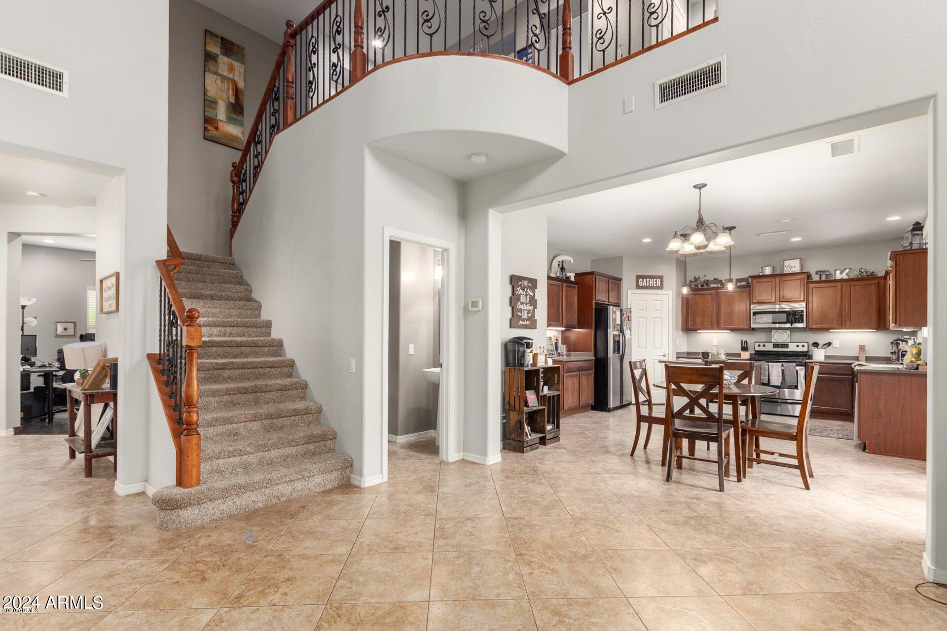 2217 West Kathleen Road Phoenix, AZ 85023 - Photo 6 of 42 a view of a dining room with furniture
