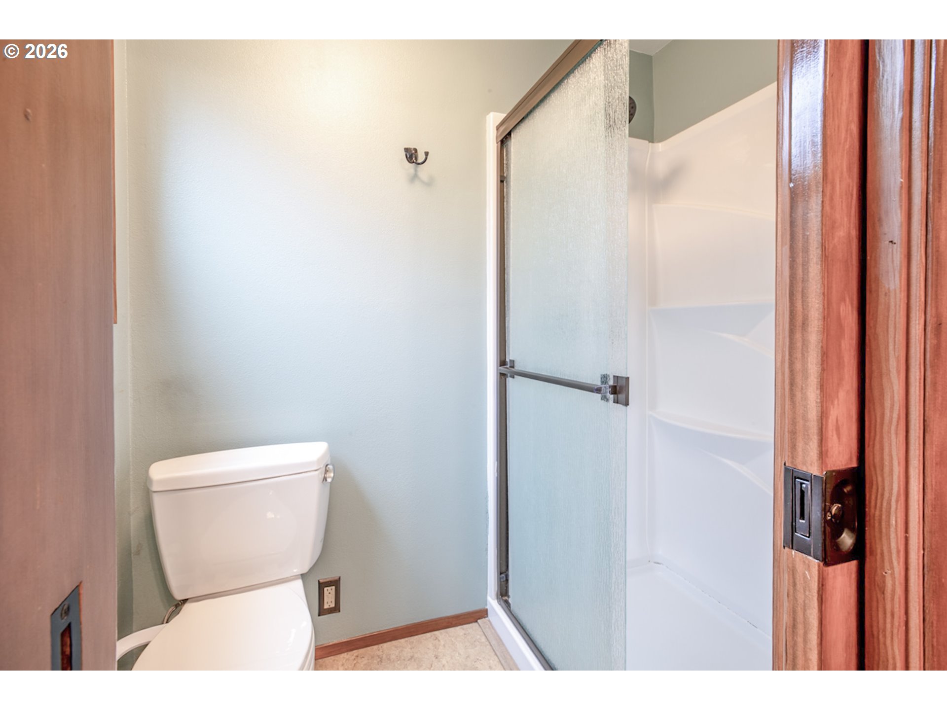 475 Banton Avenue Eugene, OR 97404 - Photo 17 of 34 a bathroom with a toilet and a shower