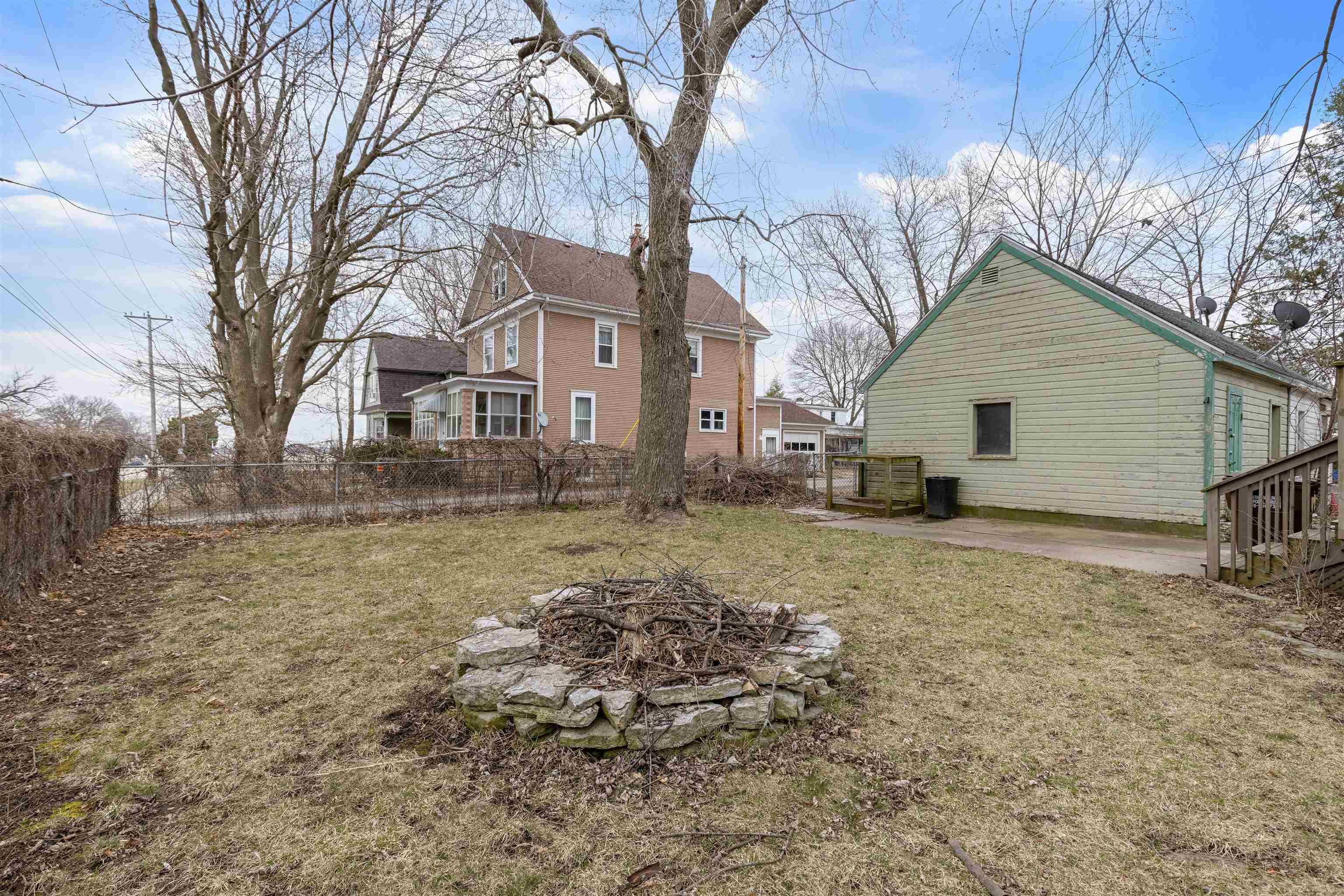 501 South 3rd Street Rochelle, IL 61068 - Photo 18 of 21 a view of a yard with a large tree