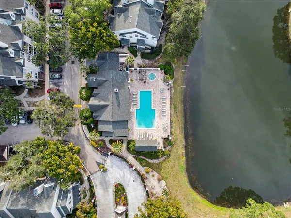 an aerial view of a house with outdoor space