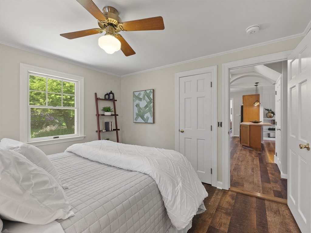 43 Ipswich Road Boxford, MA 01921 - Photo 11 of 25 a spacious bedroom with a bed and a window