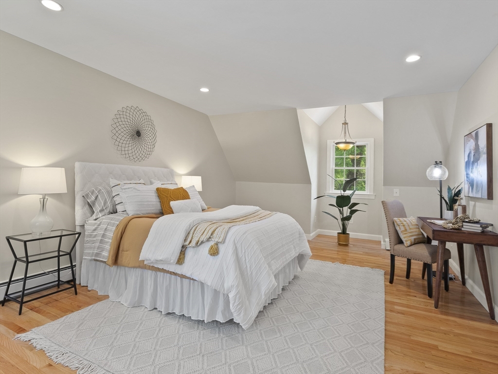 43 Ipswich Road Boxford, MA 01921 - Photo 13 of 25 a bedroom with a bed and wooden floor