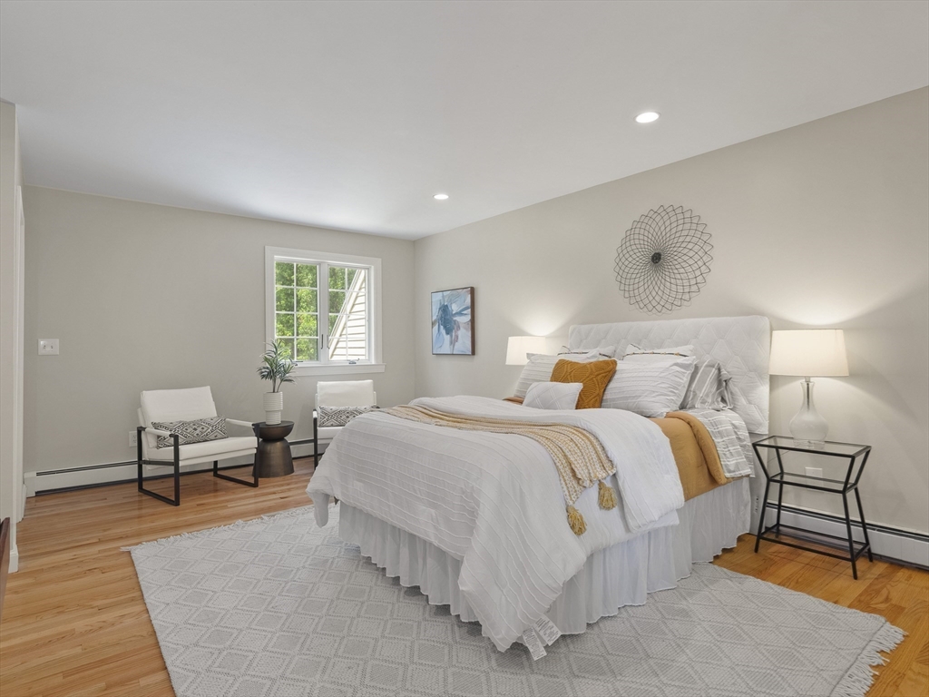 43 Ipswich Road Boxford, MA 01921 - Photo 14 of 25 a bed room with a bed and a chair