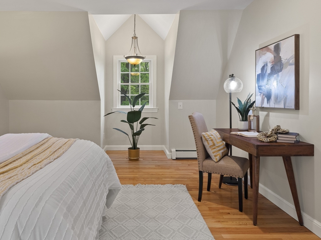 43 Ipswich Road Boxford, MA 01921 - Photo 15 of 25 a bedroom with a bed and a table