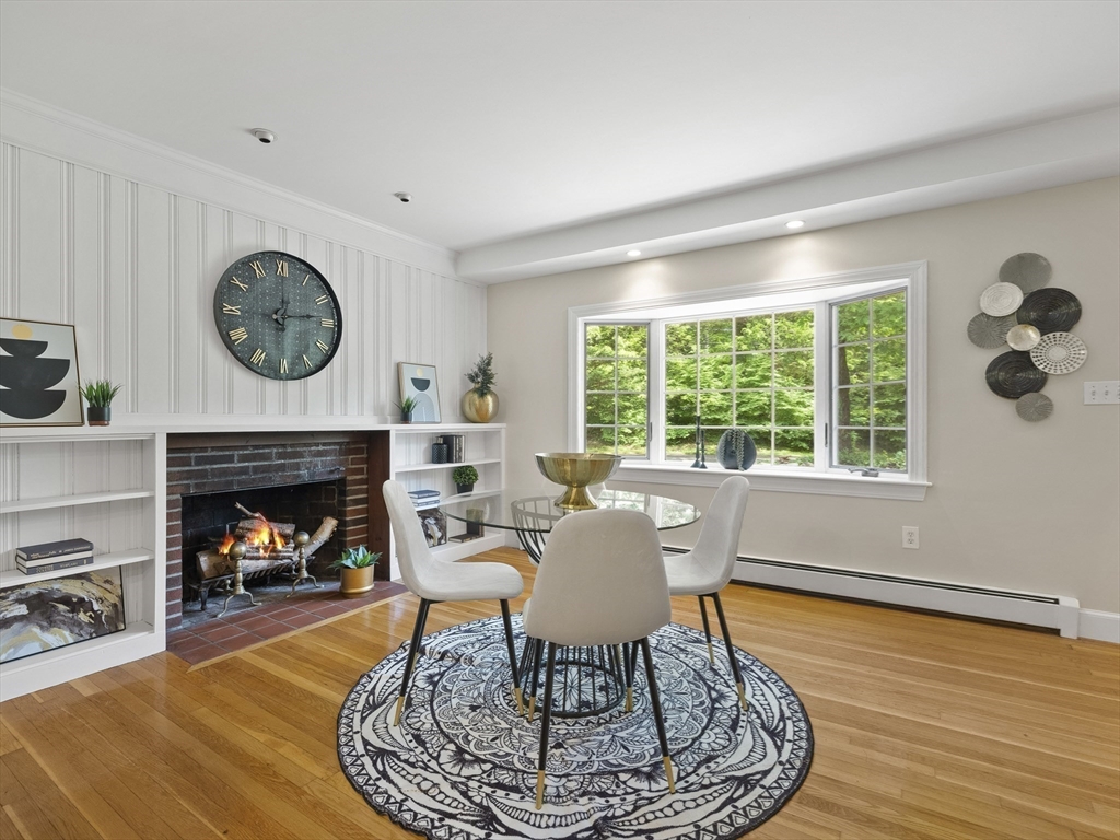 43 Ipswich Road Boxford, MA 01921 - Photo 7 of 25 a living room with furniture a fireplace and a large window