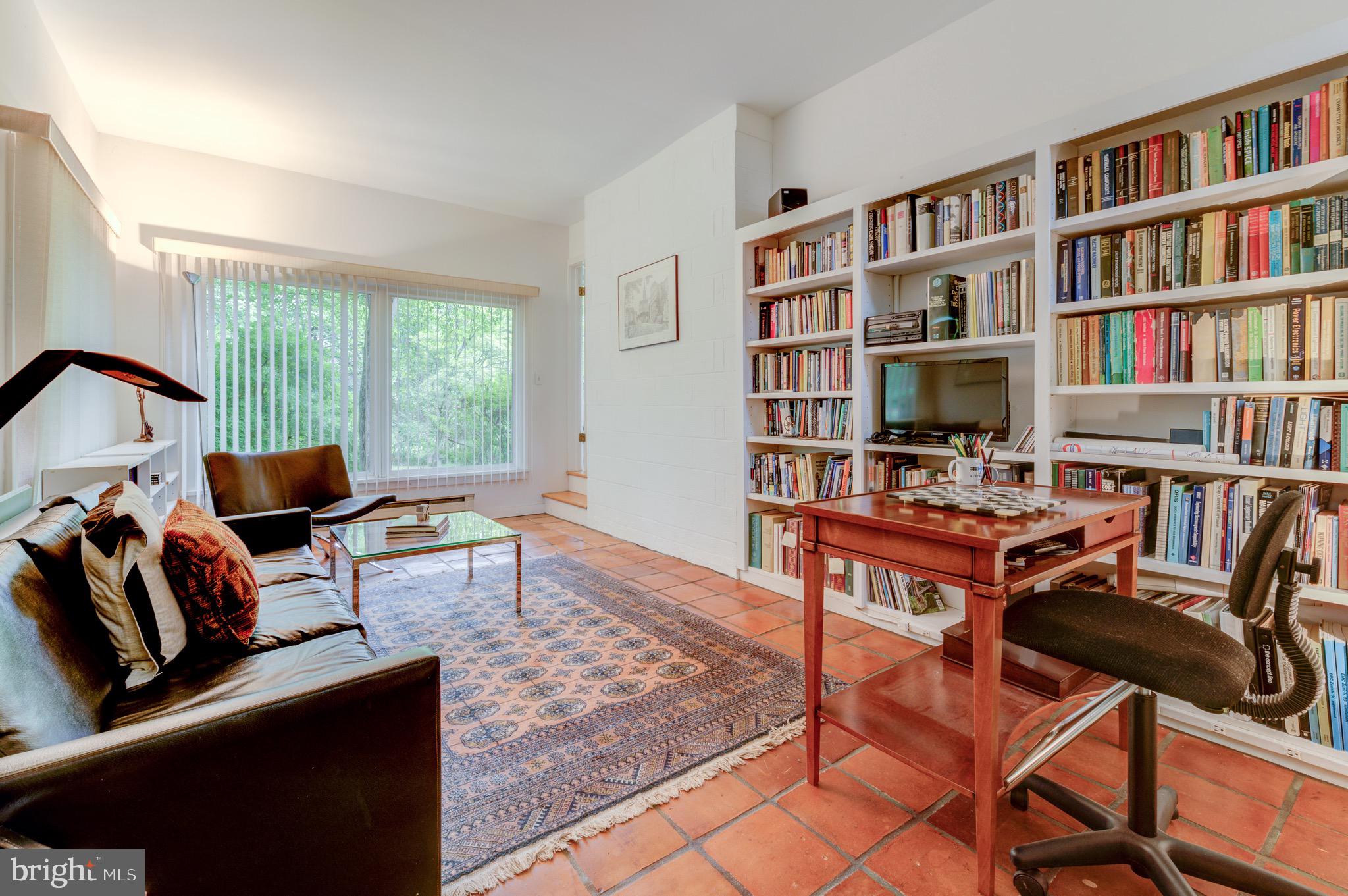 267 Hamilton Avenue Princeton, NJ 08540 - Photo 18 of 39 a work room with furniture window and book shelf