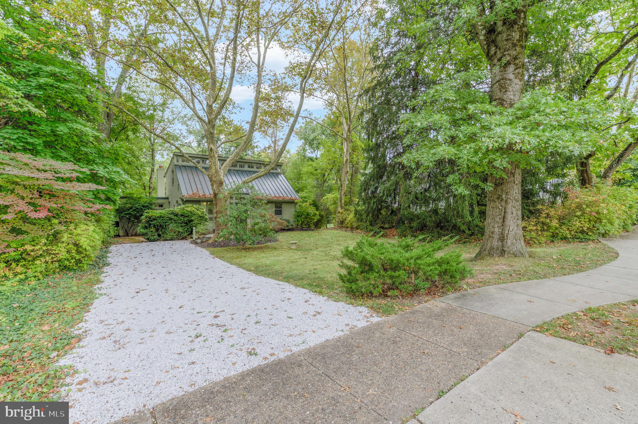 267 Hamilton Avenue Princeton, NJ 08540 - Photo 2 of 39 a view of a yard with plants and trees