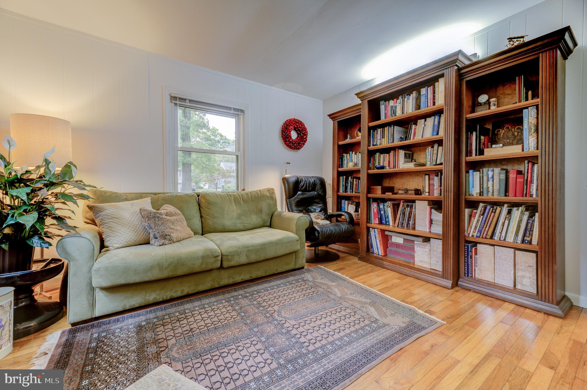 267 Hamilton Avenue Princeton, NJ 08540 - Photo 21 of 39 a living room with furniture and a book shelf