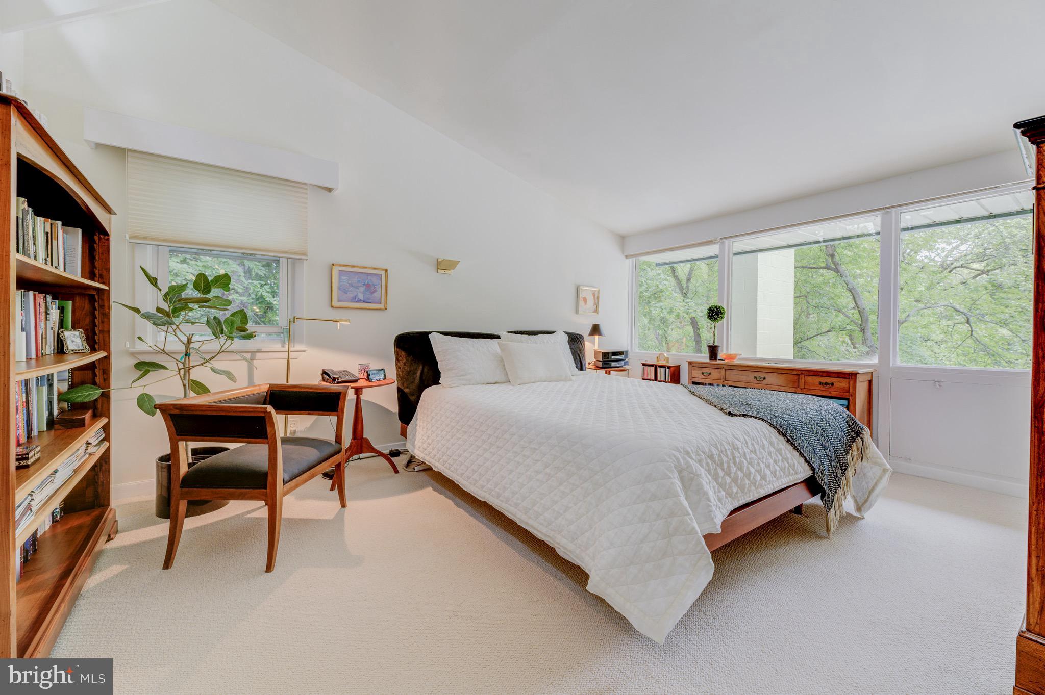 267 Hamilton Avenue Princeton, NJ 08540 - Photo 25 of 39 a bedroom with a bed and a book shelf