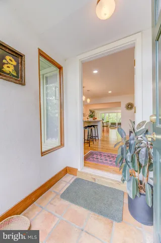 a view of entryway livingroom and hall