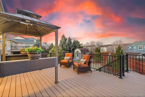a view of balcony with furniture