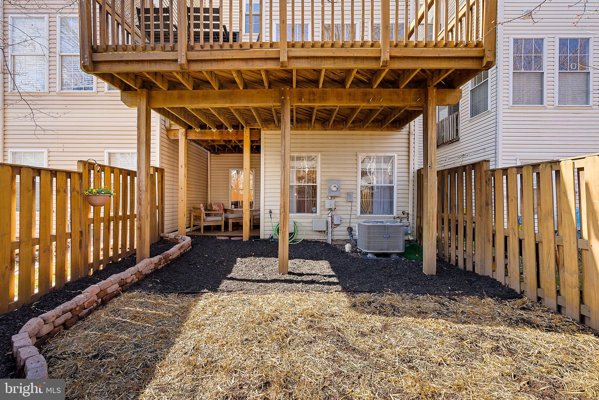 20392 Farmgate Terrace Ashburn, VA 20147 - Photo 56 of 62 a view of a house with wooden floor in front of a house