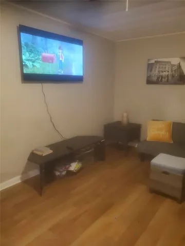 a workspace with furniture and wall painting