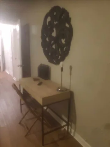 a room with a table and chairs