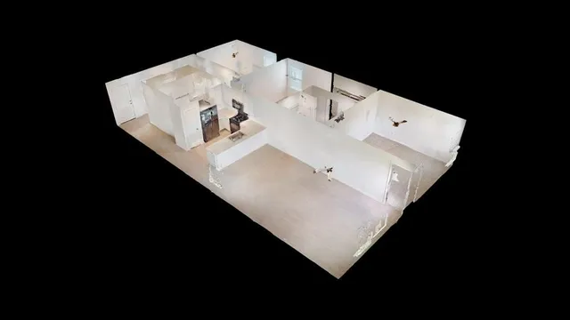 a view of backyard of house and wooden deck