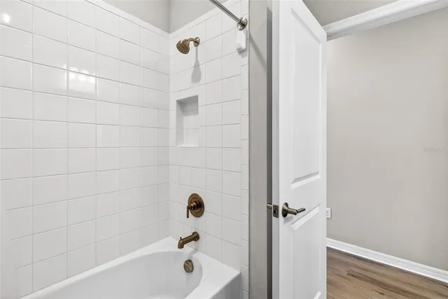 a bedroom with a bed and a cabinets