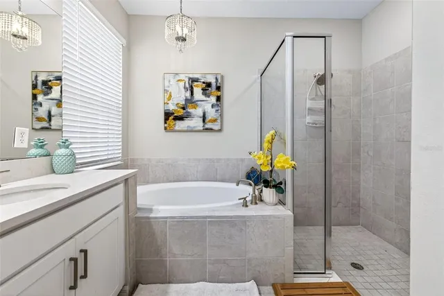 a view of a swimming pool with a lounge chairs