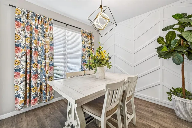 a vase of flowers sitting on a table