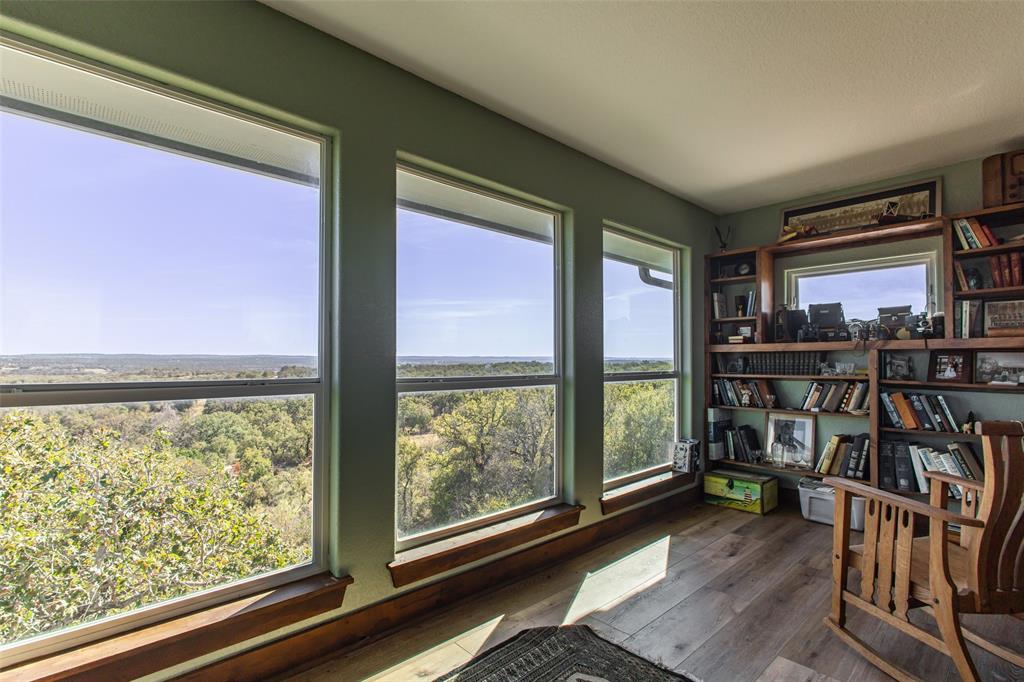 1775 Sunset Mountain Road Lipan, TX 76462 - Photo 20 of 34 a view of a furniture and an empty room