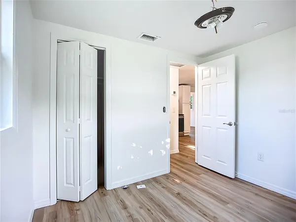 a view of a livingroom with wooden floor