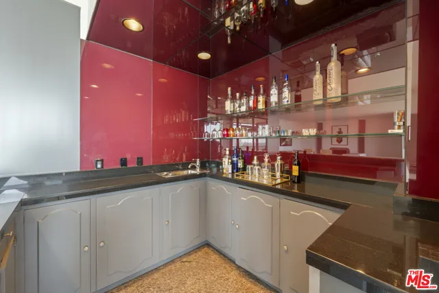 a view of balcony with furniture