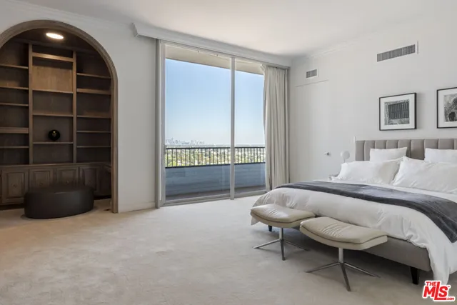 a bathroom with a double vanity sink mirror and shower