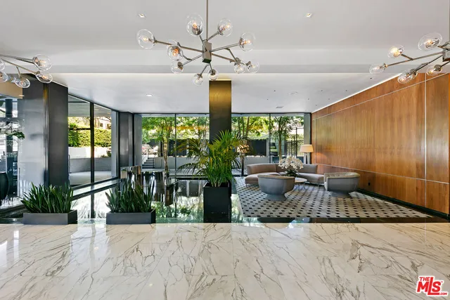 a view of a garden with a building