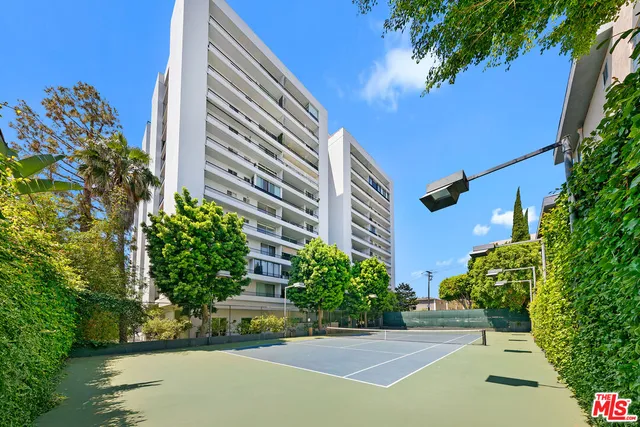 a view of a swimming pool with seating area