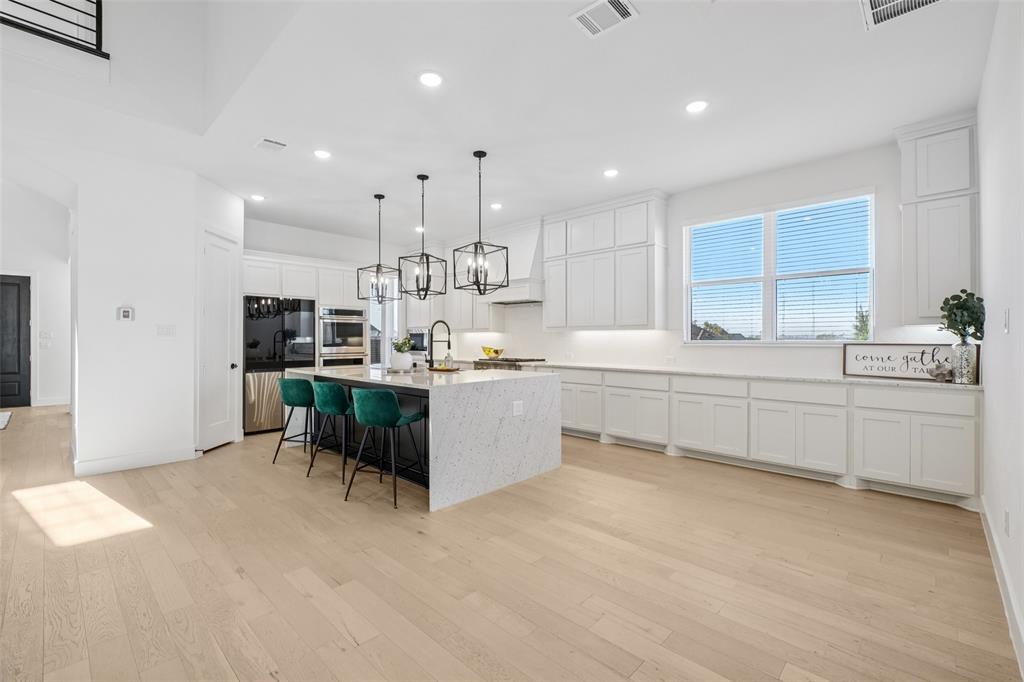 2800 Count Fleet Way Celina, TX 75009 - Photo 16 of 34 a kitchen with counter top space cabinets and appliances
