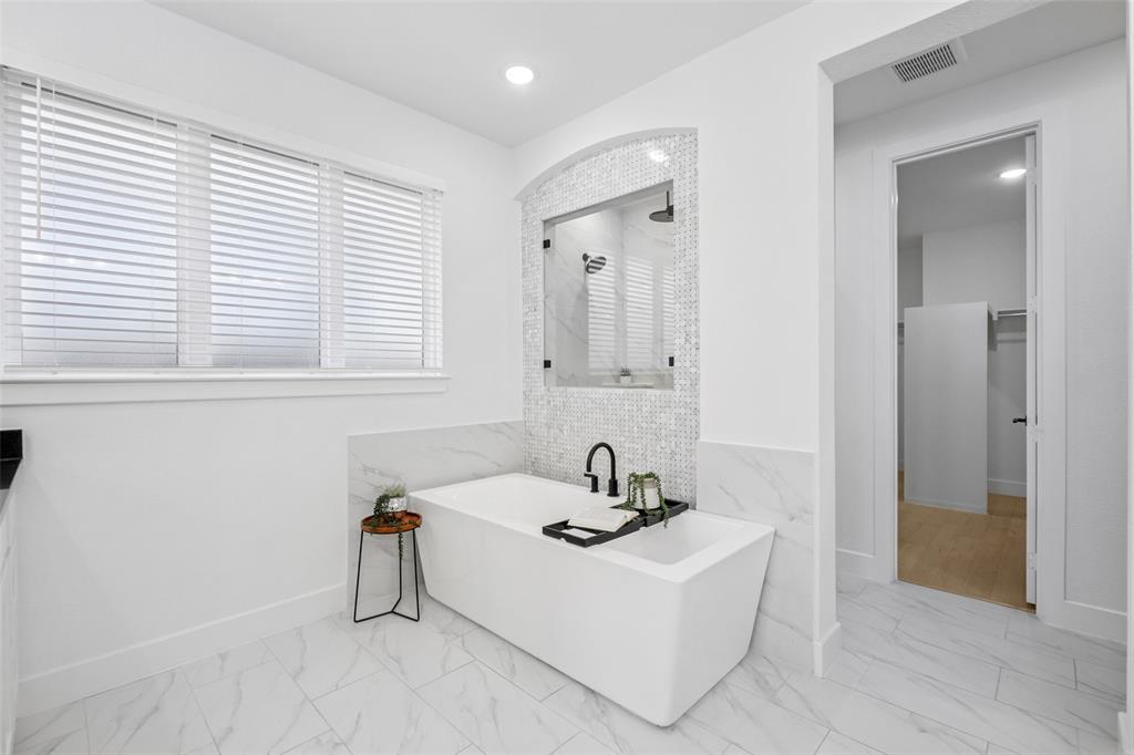 2800 Count Fleet Way Celina, TX 75009 - Photo 22 of 34 a bathroom with a sink and a bathtub