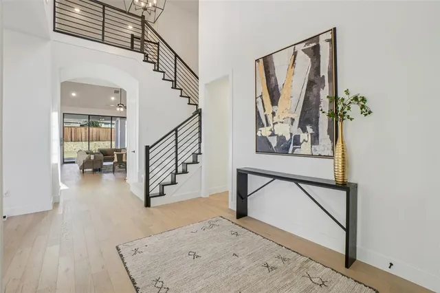 a view of an empty room with yard and balcony