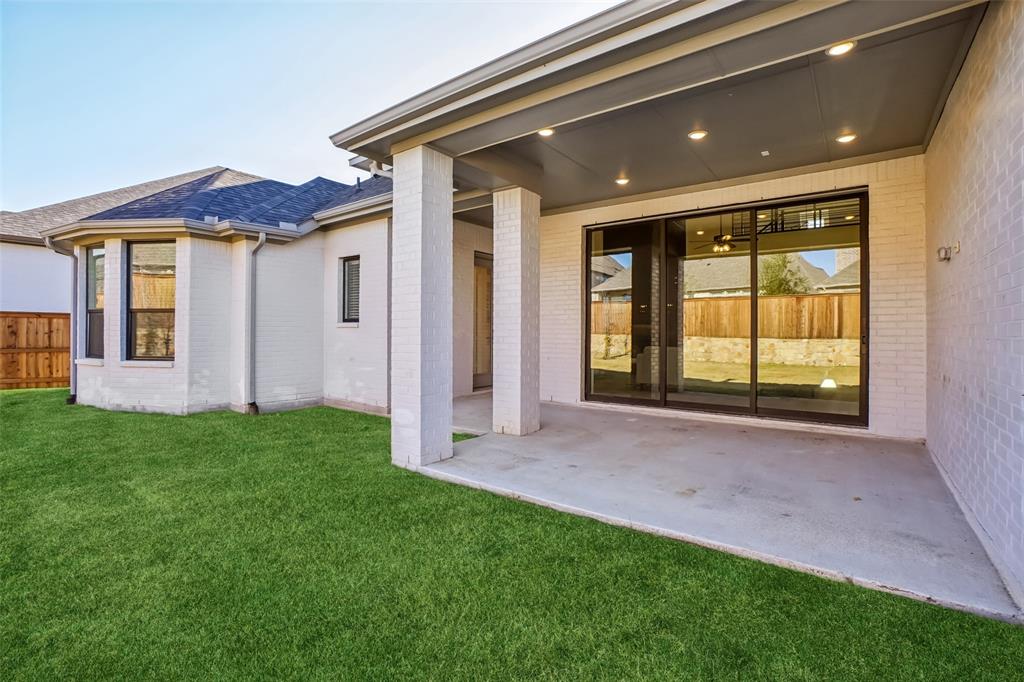 2800 Count Fleet Way Celina, TX 75009 - Photo 31 of 34 a view of a house with backyard and porch