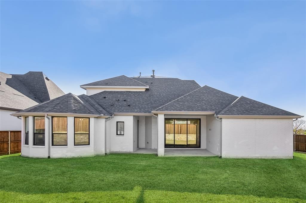 2800 Count Fleet Way Celina, TX 75009 - Photo 33 of 34 a front view of a house with a garden